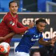 Virgil van Dijk (left) was happy to be back playing despite Liverpool's 0-0 draw against Everton