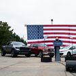 White House hopeful Joe Biden used an all-American backdrop of cars and flags as he stumped in Warren, Michigan on September 9, 2020, although one traditional campaign trail element was missing: voters