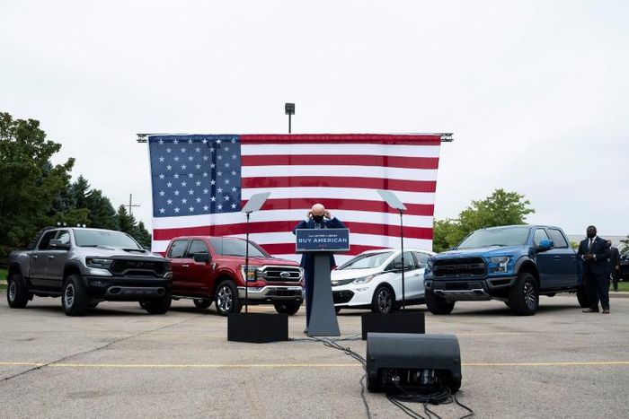 White House hopeful Joe Biden used an all-American backdrop of cars and flags as he stumped in Warren, Michigan on September 9, 2020, although one traditional campaign trail element was missing: voters