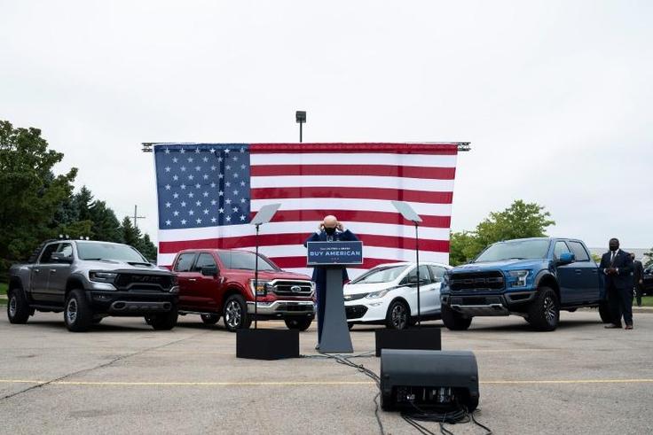White House hopeful Joe Biden used an all-American backdrop of cars and flags as he stumped in Warren, Michigan on September 9, 2020, although one traditional campaign trail element was missing: voters