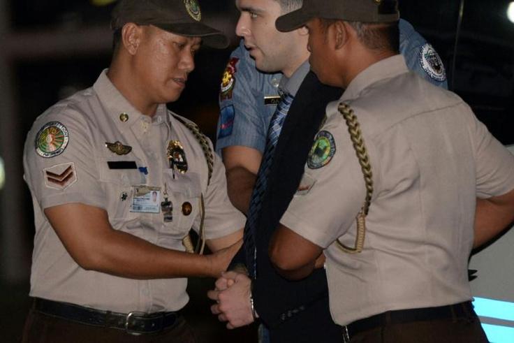 US Marine Lance Corporal Joseph Scott Pemberton is escorted by Philippines police at Camp Aguinaldo in Quezon City in December 2015