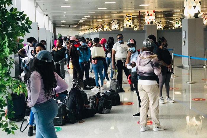 Another 71 Nigerians trafficked to Lebanon arrive home. [Twitter/@nidcom_gov]