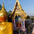 A face mask was placed on the face of a giant Buddha statue outside Bangkok