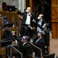Senators in Chile give the thumbs up as they vote on pension reform