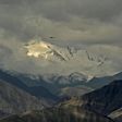 An Indian fighter jet flies over Leh, the joint capital of the union territory of Ladakh, on June 25, 2020, part of a show of strength after a border showdown between Delhi and Beijing