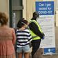 People line up for coronavirus testing at Bondi Beach in Sydney
