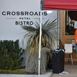 Positive cases linked to the Crossroads Hotel grew to almost 30