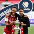 Mikel Arteta (right) is confident Pierre-Emerick Aubameyang (left) will remain at Arsenal