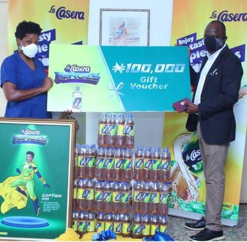 L-R: Captain Ami; Dr Amara Allison and National Trade Marketing Manager, The La Casera Company, Olusegun Olukuewu at the gift presentation in Ogun State.