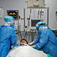 Nurses check the intubation of a COVID-19 patient in Lima, Peru, which has topped 10,000 deaths