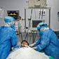 Nurses check the intubation of a COVID-19 patient in Lima, Peru, which has topped 10,000 deaths