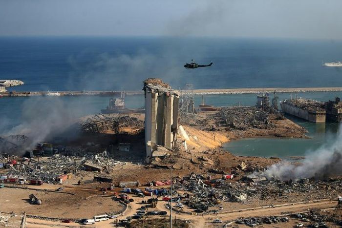 A view of the damaged grain silos of Beirut's harbour and its surroundings one day after a powerful twin explosion tore through Lebanon's capital