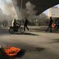 Iranian protesters angered by an increase of up to 200 percent in the price of petrol gather under an overpass in the central city of Isfahan on November 16, 2019
