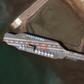 This handout satellite image obtained courtesy of  Maxar Technologies shows a mockup aircraft carrier being prepared in the Iranian port of Bandar Abbas on February 15