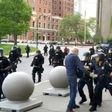 In this still image courtesy of National Public Radio (NPR) television station WBFO and taken by Mike Desmond, Buffalo, New York, police shove a 75-year-old protester to the ground on June 4, 2020