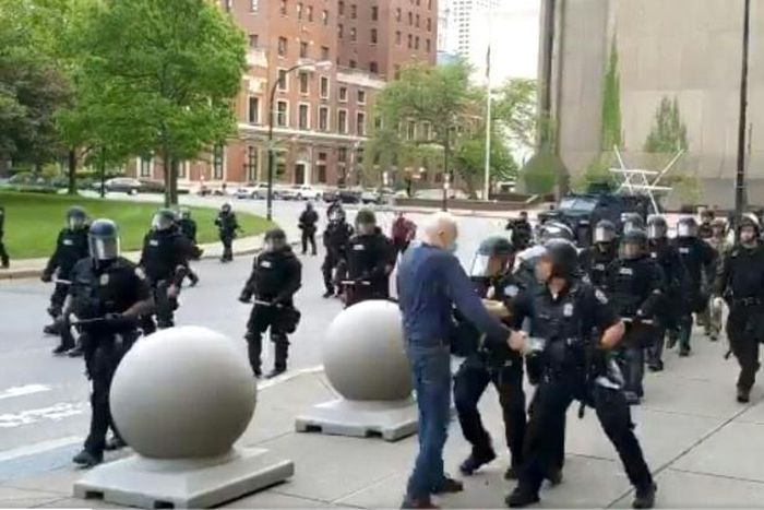 In this still image courtesy of National Public Radio (NPR) television station WBFO and taken by Mike Desmond, Buffalo, New York, police shove a 75-year-old protester to the ground on June 4, 2020