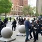 In this still image courtesy of National Public Radio (NPR) television station WBFO and taken by Mike Desmond, Buffalo, New York, police shove a 75-year-old protester to the ground on June 4, 2020
