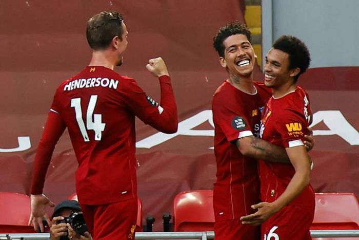 Liverpool captain Jordan Henderson (left) hailed the impact of manager Jurgen Klopp on the club