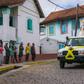 Father Pedro hopped on the back of a four-wheel drive and paraded through the town of Akamasoa