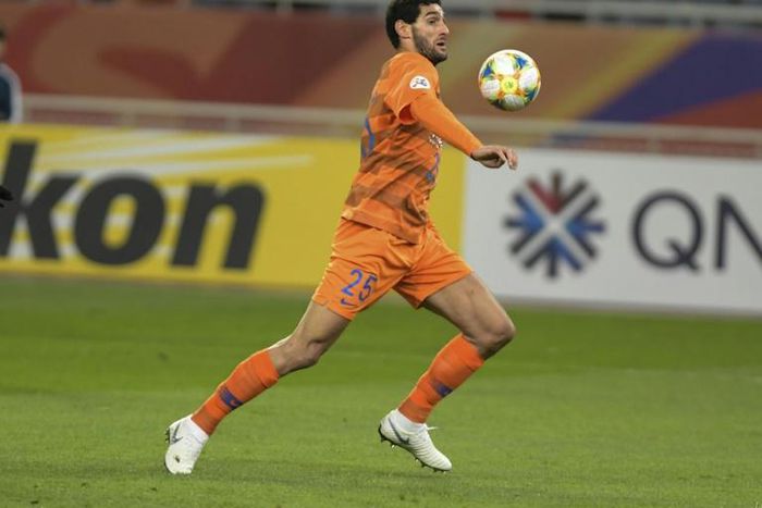 Shandong Luneng midfielder Marouane Fellaini scored three quick-fire headers