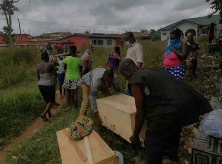 Families storm cemetery to pick exhumed corpses of relatives
