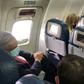 Mexican President Andres Manuel Lopez Obrador wore a face mask on the plane as he traveled to Washington to meet US President Donald Trump