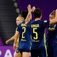 Lyon's players celebrate their victory over Bayern Munich