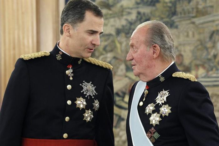 Spain's former king Juan Carlos said he is leaving the country to help his son, the current King Felipe VI, "exercise his responsibilities"