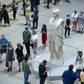 Visitors line up at the entrance to New York's Metropolitan Museum on August 29, 2020 for its reopening after a months-long closing due to the pandemic