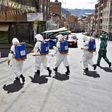 Municipal workers disinfect the streets of La Paz as a preventive measure to slow the spread of the novel coronavirus