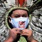 Indigenous Kaingang leader Kretan Kaingang marches in protest against President Jair Bolsonaro as Brazil's COVID-19 death toll reaches new heights
