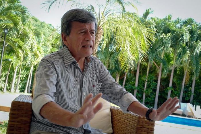 Pablo Beltran, commander of Colombia's ELN rebels, gestures during an interview with AFP in Havana