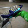 Katharina Obladen and Tanja Nickel have seen demand for their virus-killer products skyrocket -- here a student cleans a shopping trolley for disinfection at their workshop in Cologne