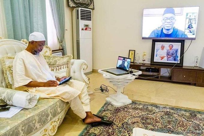 Aregbesola monitors his first ever virtual colloquium from his living room (Aregbesola media)