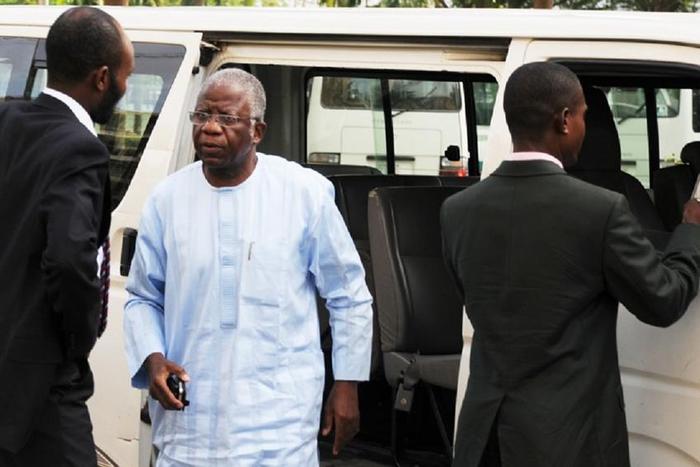 Former Head of Service of the Federation, Steve Oronsaye (middle) on arrival at the Federal High Court, Abuja to a 24-count charge of corruption. He has been charged for another two-count charge of corruption and obtaining by through false pretense. PH...