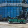 A group of people gather outside of a mall in Havana July 16, 2020 during the coronavirus pandemic