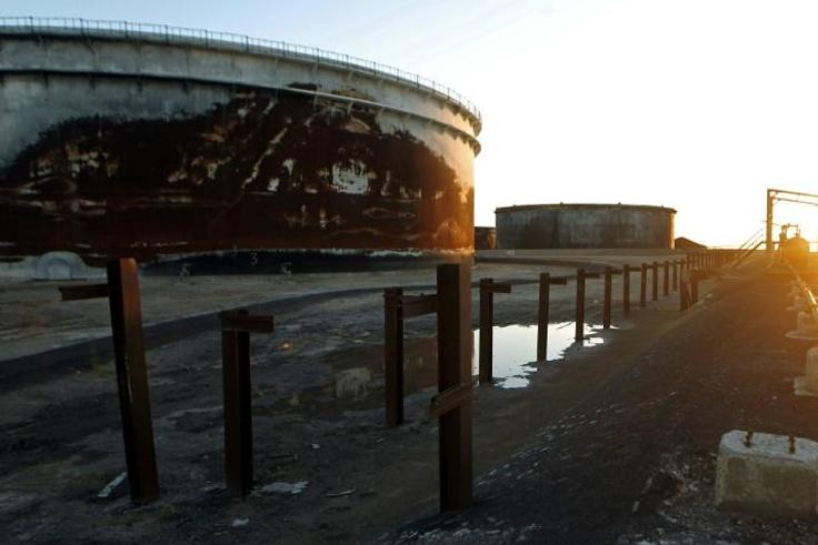 A first ship was due to start loading crude from the oil port Al-Sidra in the east of the country, Libya's National Oil Corporation said