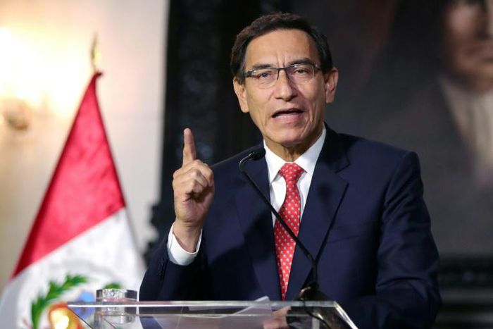 Peru' Congress voted to open impeachment proceedings against President Martin Vizcarra (shown September 10, 2020 in a handout picture from the Peruvian Presidency) for "moral incapacity" over accusations he incited aides to lie to investigators
