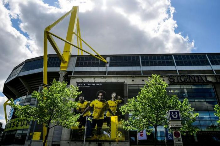 Borussia Dortmund's Signal Iduna Park stadium would normally have hosted 82,000 spectators for the Ruhr derby with Schalke 04