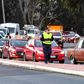 Long queues of cars were backed up at Victoria's border Wednesday after neighbouring state New South Wales closed the boundary
