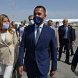 Italian Foreign Minister Luigi Di Maio (R) is welcomed on his arrival in Tunis by Tunisian Secretary of State for Foreign Affairs Salma Ennaiefer