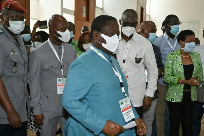 Ex-Ivory Coast president Henri Konan Bedie casts his ballot in his party's convention to select a candidate for October's election