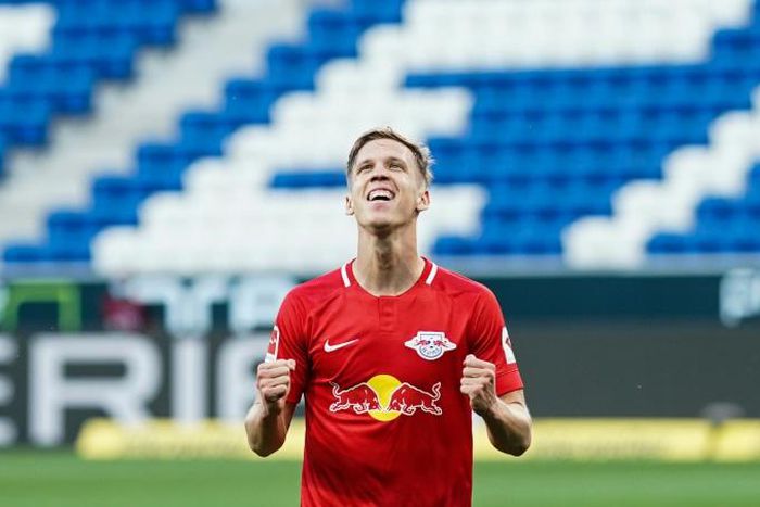 Twice as good: Dani Olmo celebrates scoring his second goal