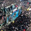 Iranian mourners gather in January 2020 around a vehicle carrying the coffin of slain top general Qasem Soleimani, whose killing by the United States a UN expert has concluded was unlawful