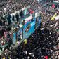 Iranian mourners gather in January 2020 around a vehicle carrying the coffin of slain top general Qasem Soleimani, whose killing by the United States a UN expert has concluded was unlawful