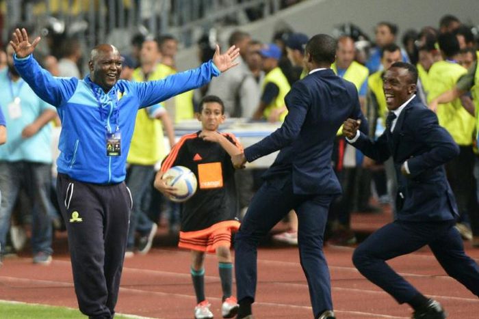 Mamelodi Sundowns coach Pitso Mosimane (L) celebrates winning the 2016 CAF Champions League