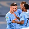 Phil Foden (left)scored the winner as Manchester City remained in contention for a fourth straight League Cup