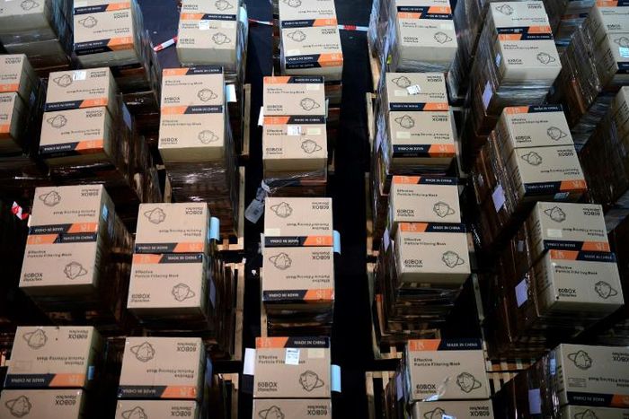 Boxes with protective masks from China -- which has exerted growing influence during the COVID-19 crisis -- are seen at a state camp in Dusseldorf, Germany, in June 2020