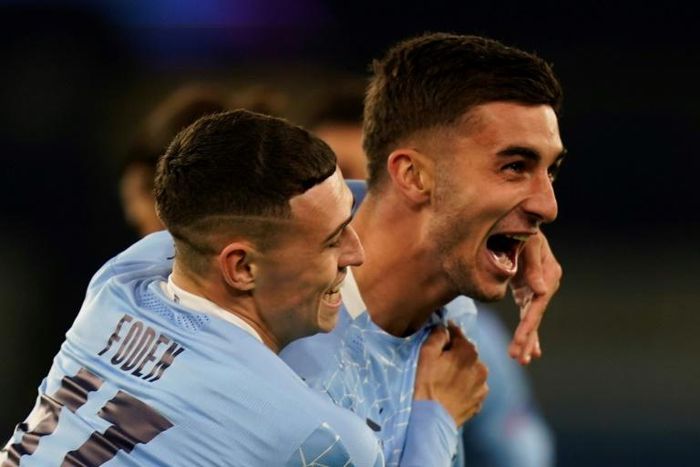 Phil Foden (left) and Ferran Torres (right)combined for Man City's third goal
