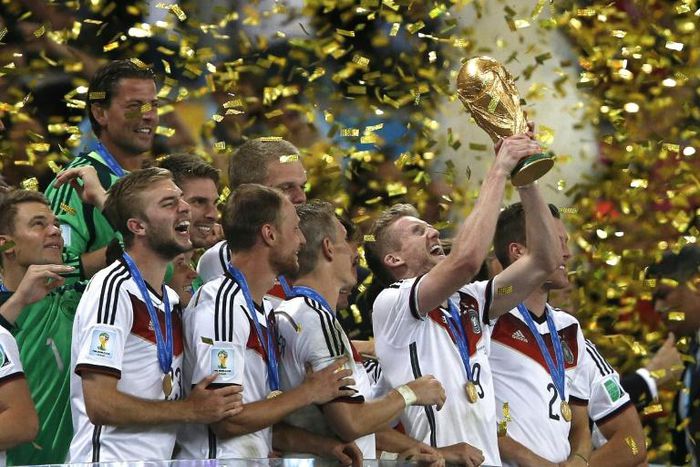 Andre Schuerrle (C), seen here winning the 2014 World Cup with Germany, has announced his retirement from football on Friday at the age of just 29.